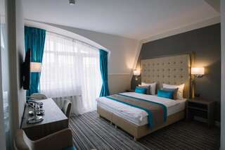 Отель Norm Hill Hotel Клуж-Напока Двухместный номер Делюкс с 1 кроватью или 2 отдельными кроватями и гидромассажной ванной-1